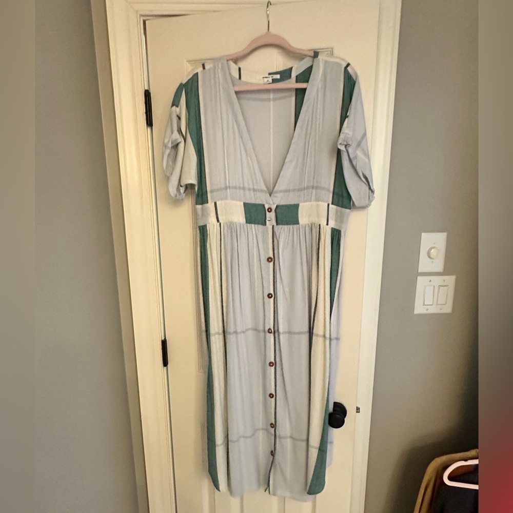 O’Neill low cut, long dress. Never worn. No tags.